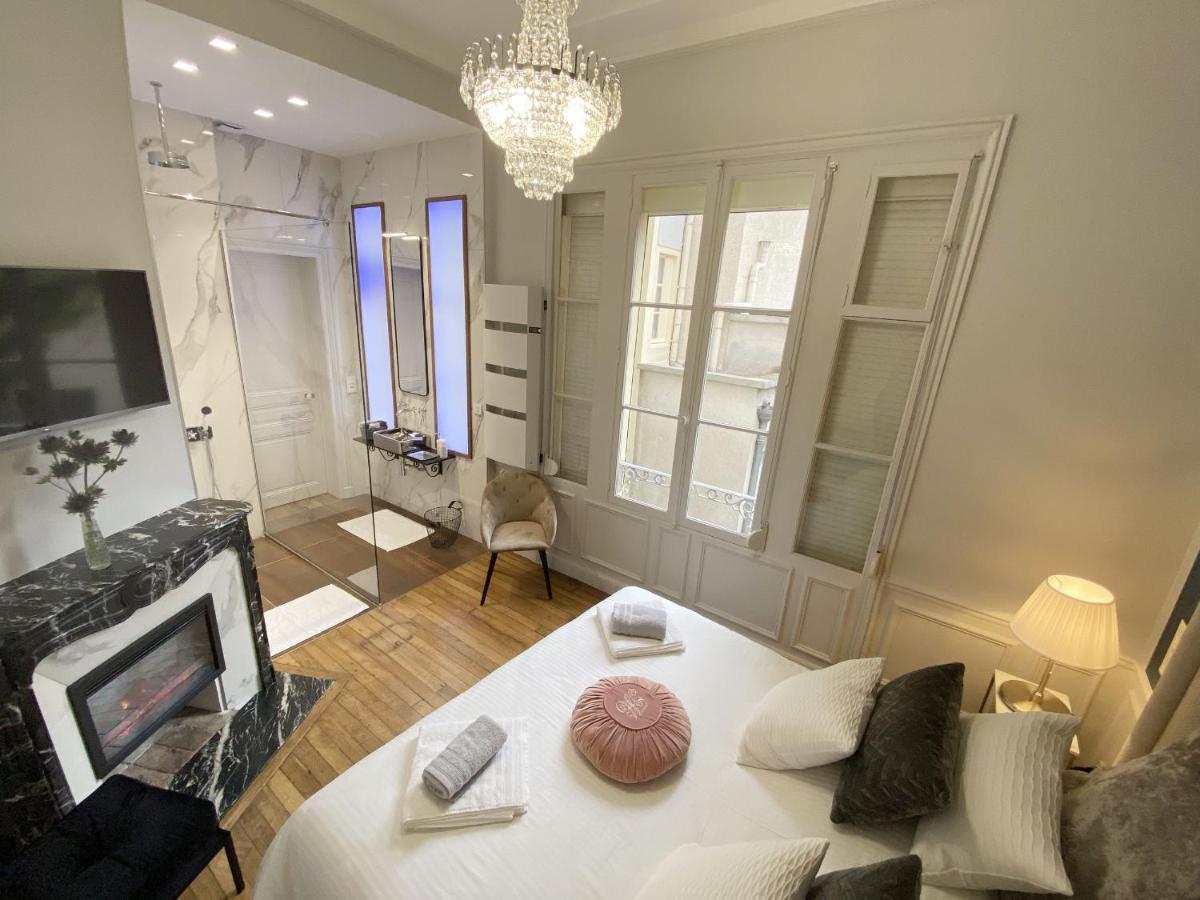 Le Clovis Suites Spa Sauna Reims Esterno foto